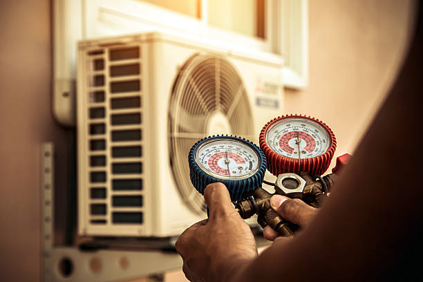 Professional Hvac technician working in Blissfield, MI